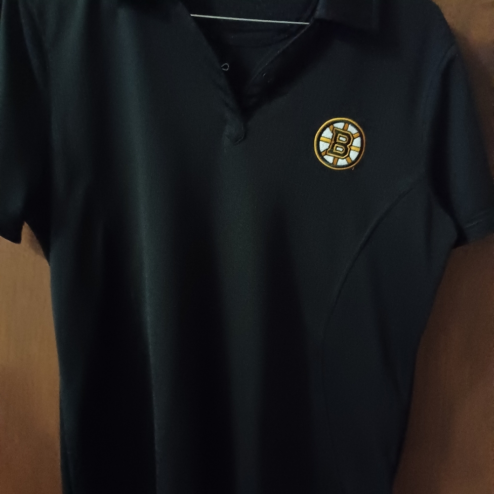 Womans golf type shirt with boston bruins logo